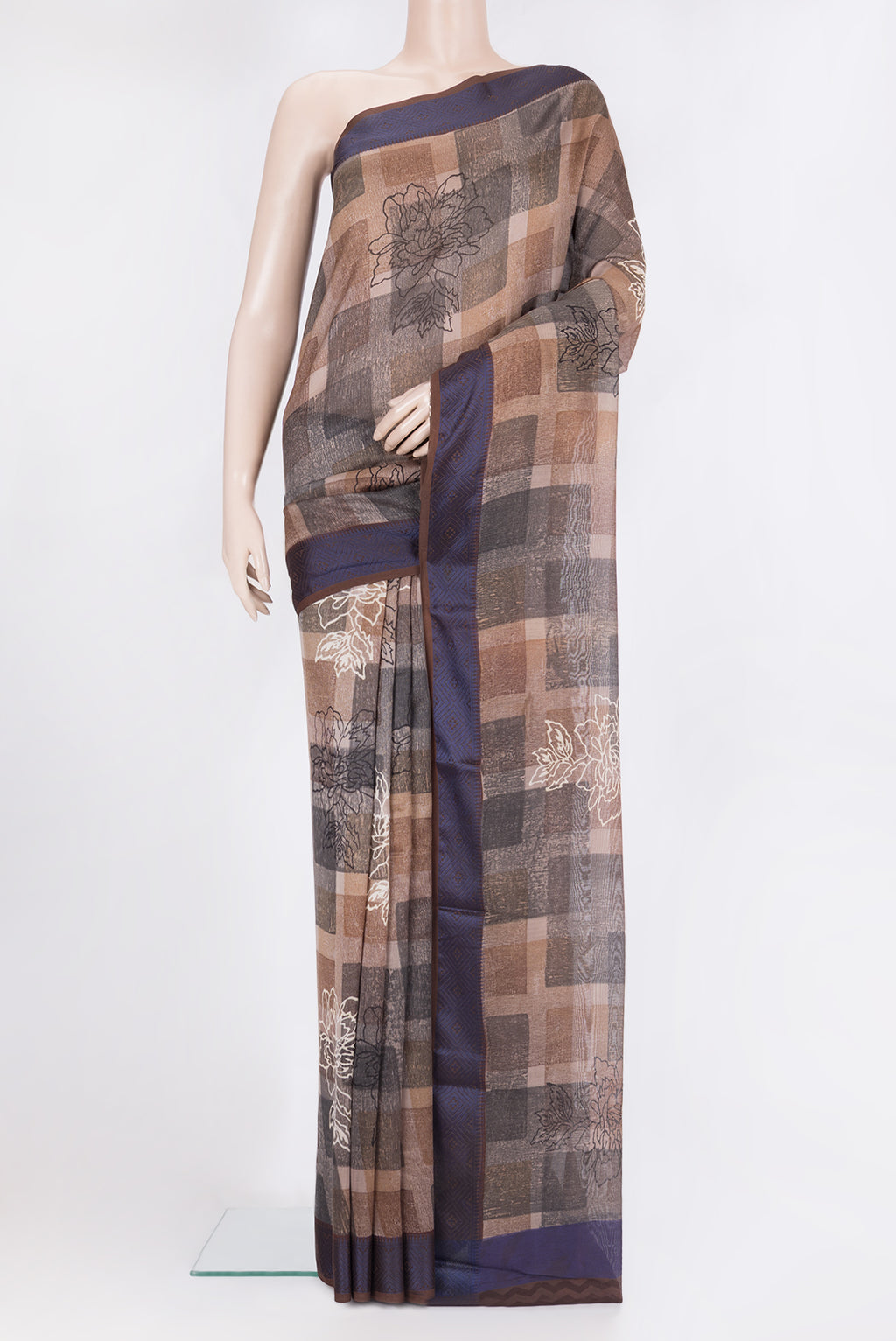 Brown Chanderi Cotton Saree with Printed design on the body and Thread Border.  displayed on a mannequin