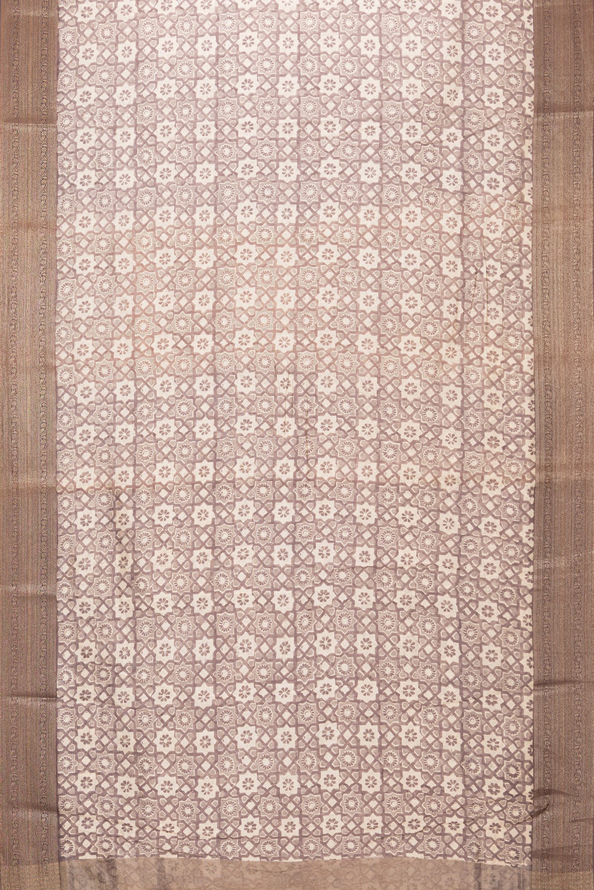 Flat view of Brown Dual Tone Chanderi Silk Saree with Printed design on the body and Zari Border. 