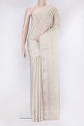 Beige Kota Silk Saree with Embroidery on the body and Embroidery Border.  displayed on a mannequin