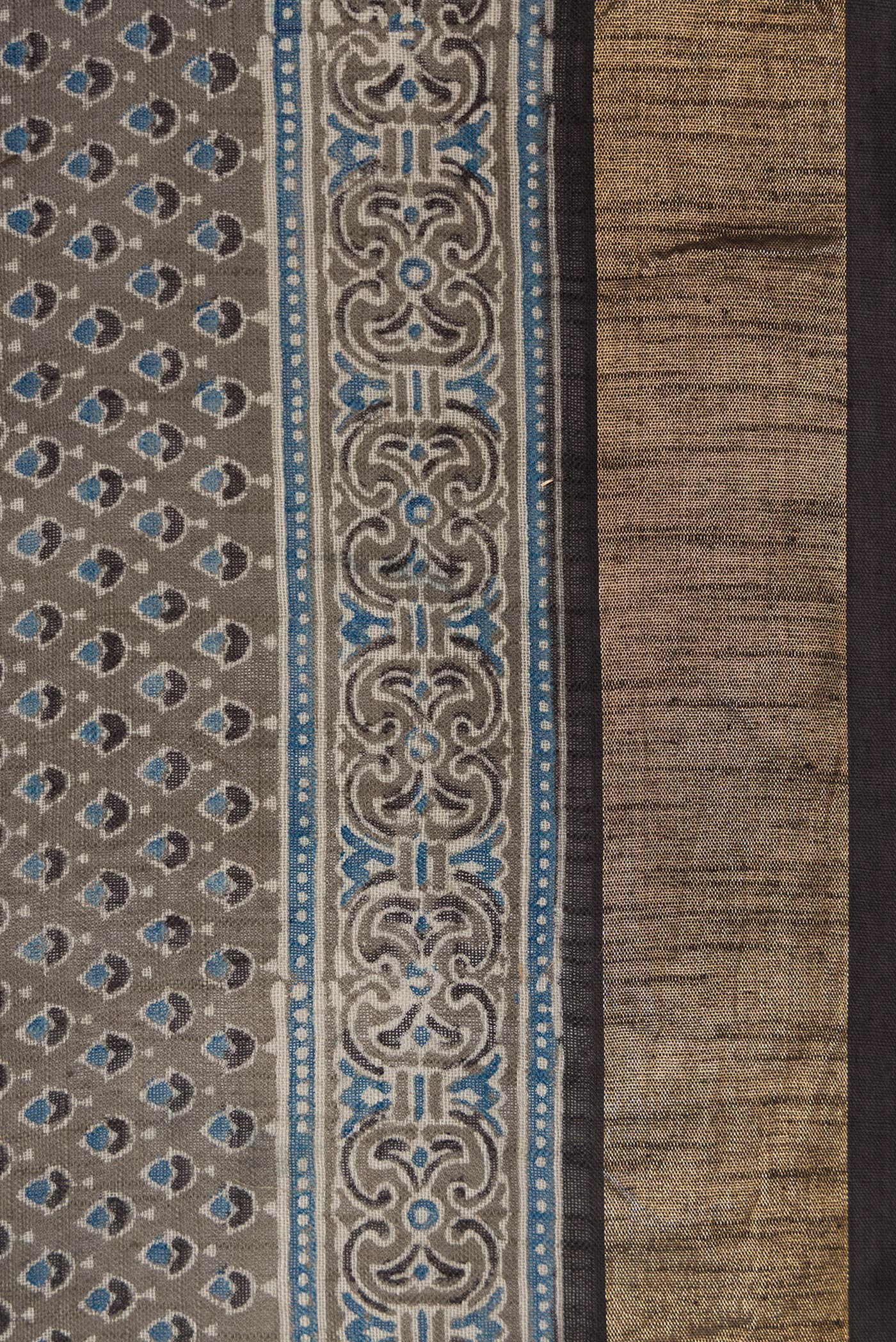 Border image of Grey Dual Tone Cotton Saree with Ajrakh Print on the body and Zari Border. 