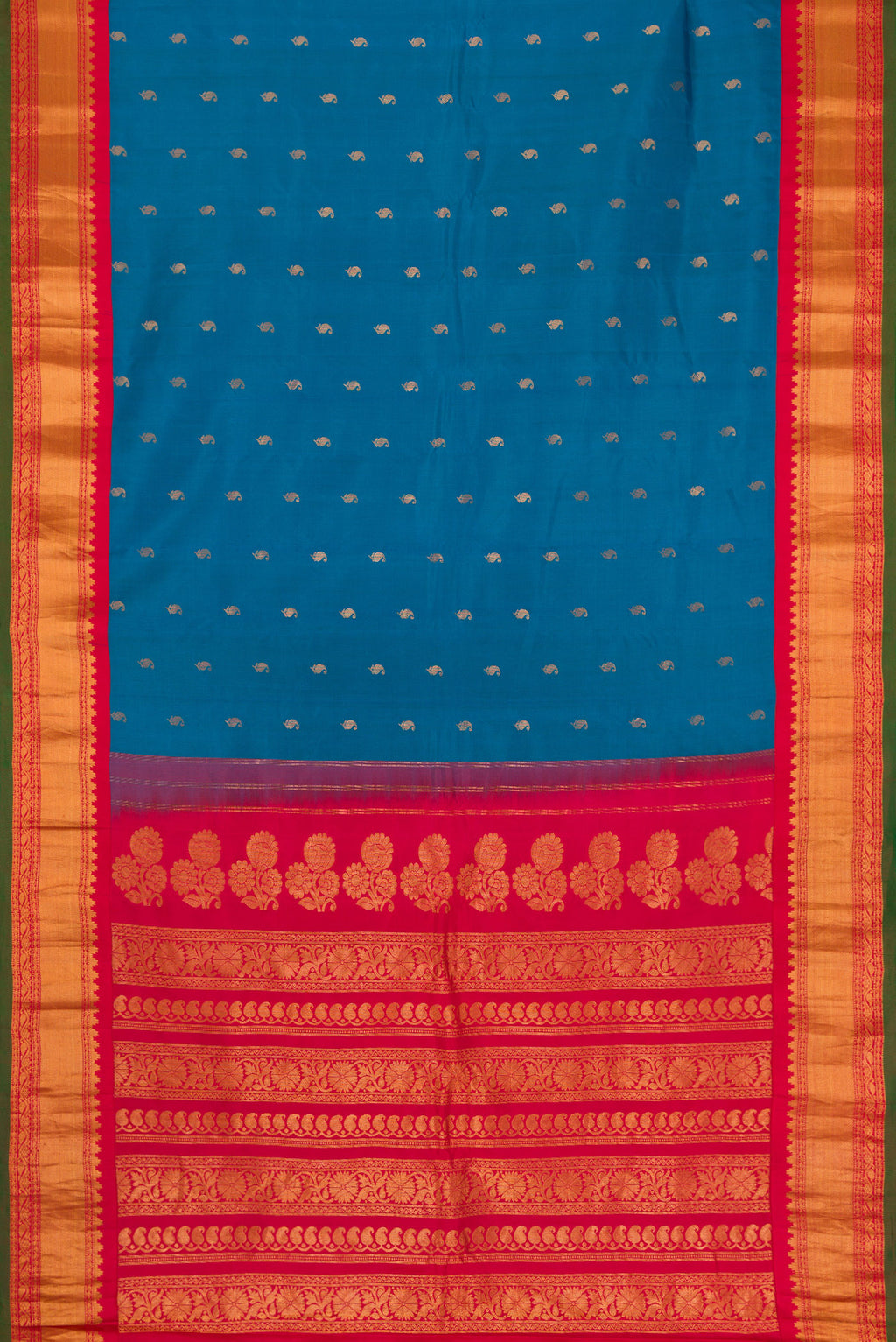 Flat view of Peacock Blue Dual Tone Gadwal Silk Saree with Zari Butta on the body and Zari Border. 