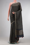 Navy Blue Dual Tone Tussar Silk Saree with Printed design on the body and Thread Border.  displayed on a mannequin