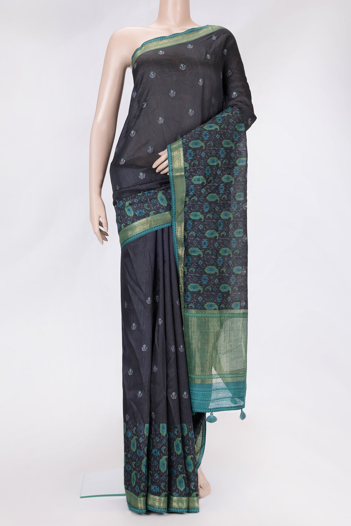 Black Dual Tone Tussar Silk Saree with Embroidery on the body and Fancy Border.  displayed on a mannequin