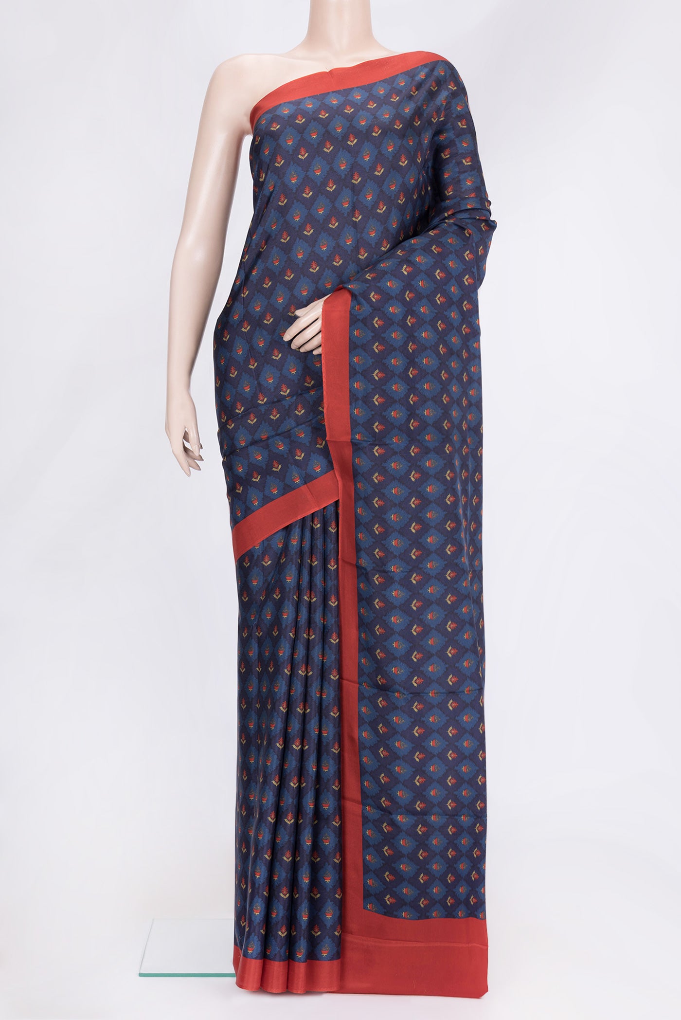 Navy Blue Dual Tone Printed Silk Saree with Printed design on the body and Plain Border.  displayed on a mannequin