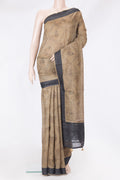Beige Tussar Silk Saree with Printed design on the body and Embroidery Border.  displayed on a mannequin