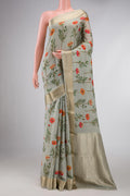 Green Dual Tone Mysore Crepe Saree with Printed design on the body and Zari Border displayed on a mannequin