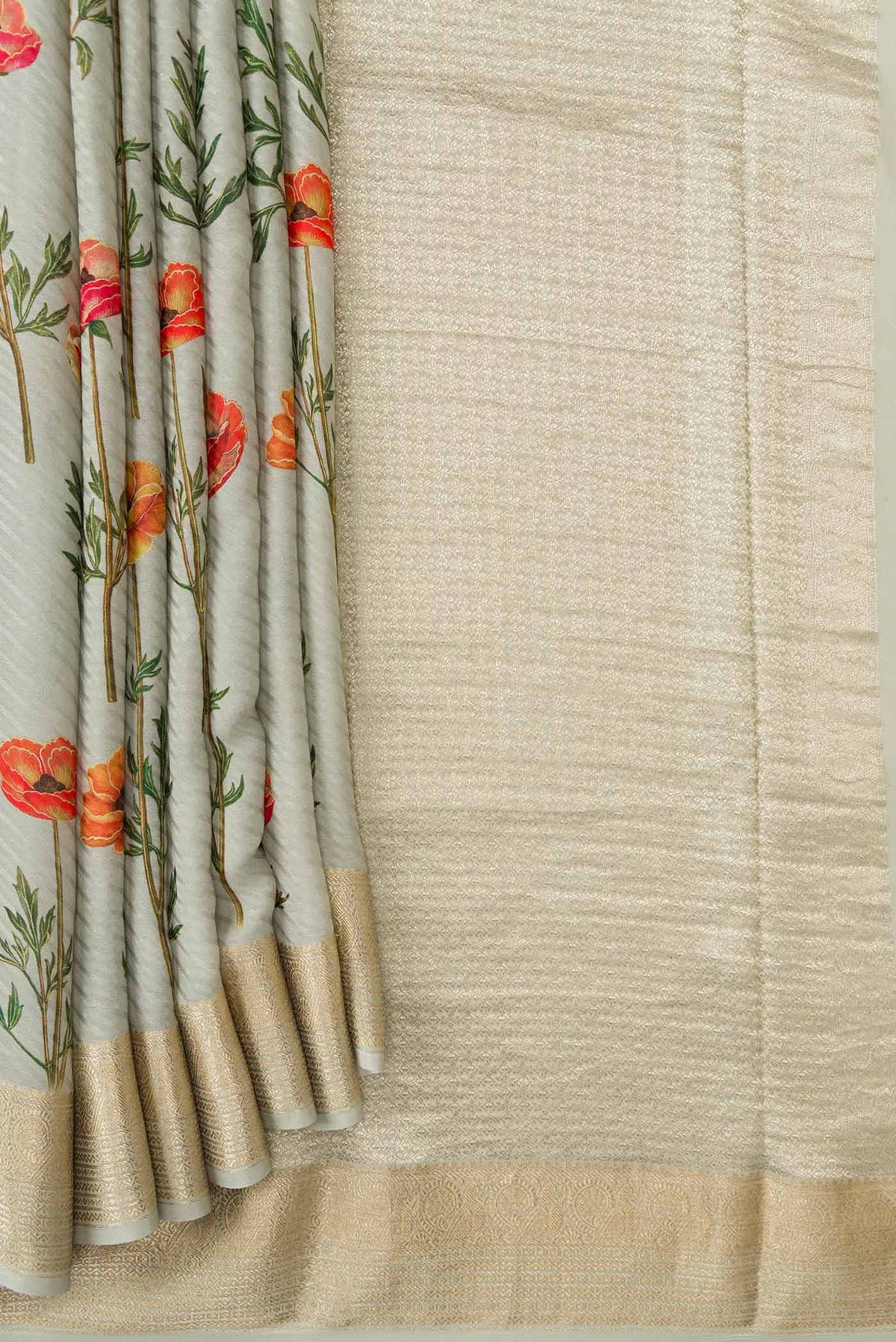 Pleats and pallu of Green Dual Tone Mysore Crepe Saree with Printed design on the body and Zari Border