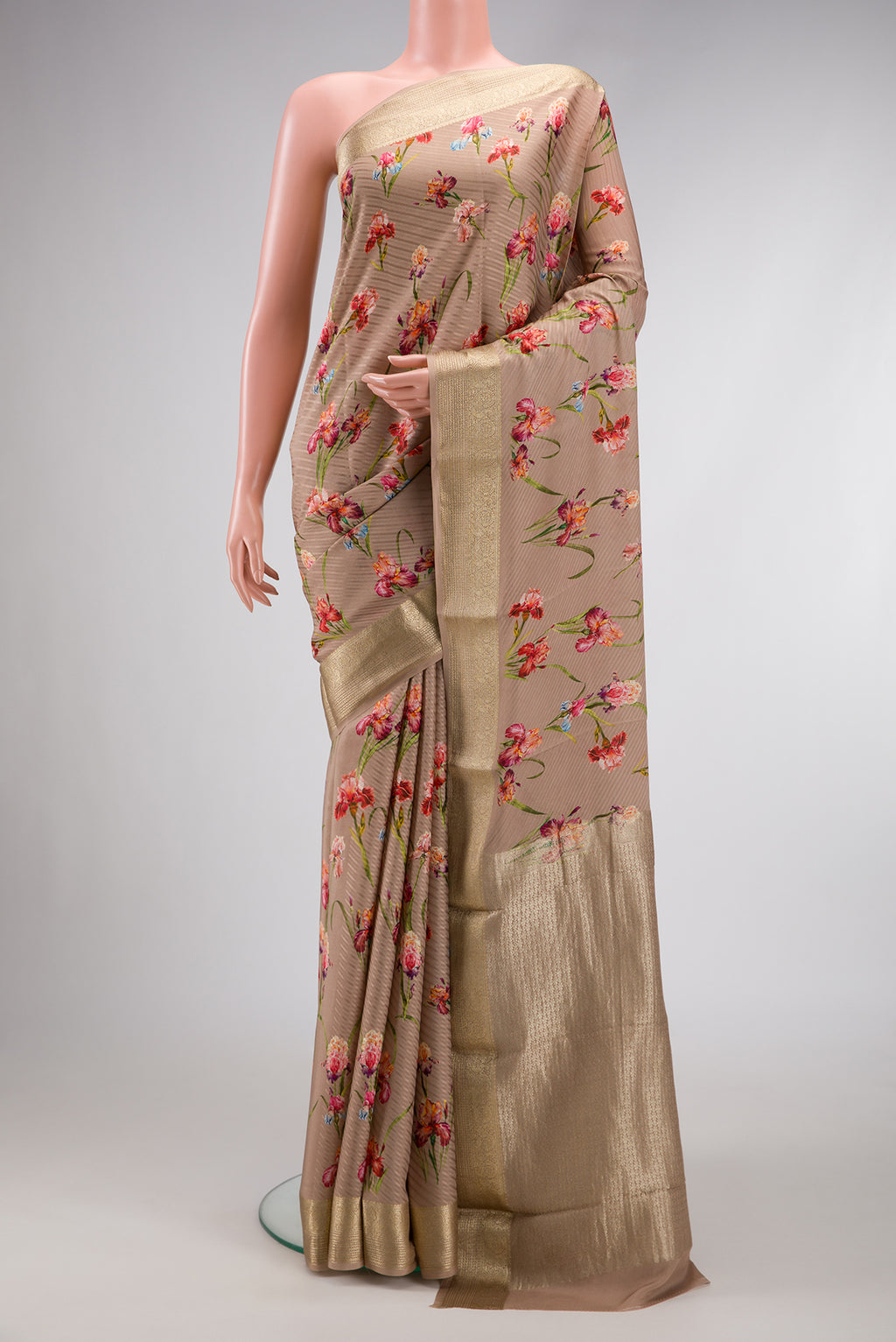 Dark Beige Dual Tone Mysore Crepe Saree with Printed design on the body and Zari Border.  displayed on a mannequin