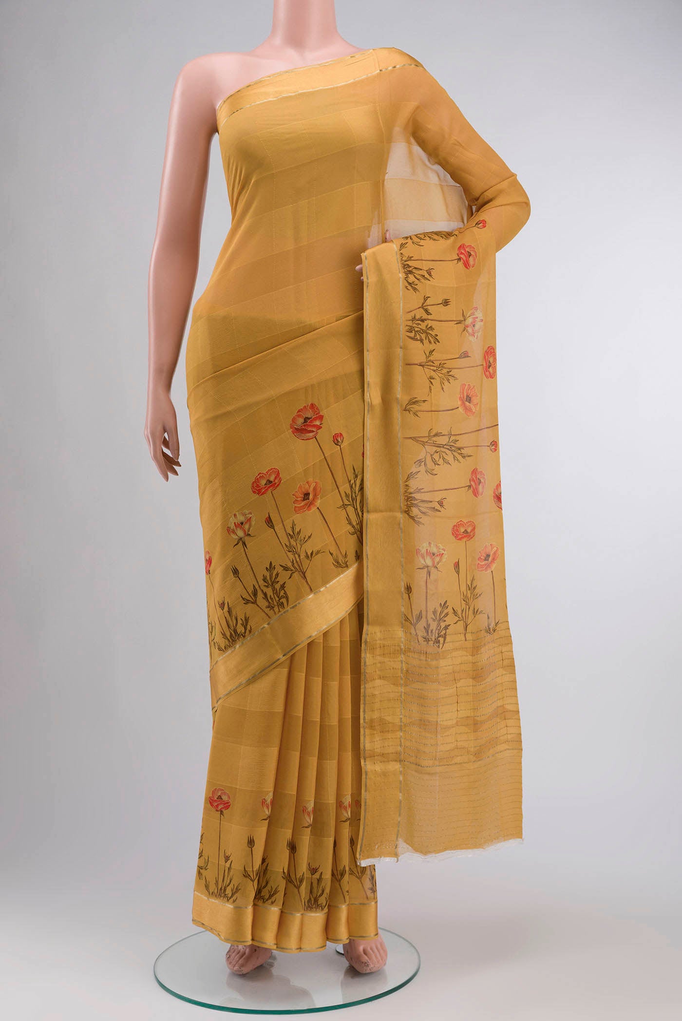Yellow Mysore Chiffon Saree Printed design on the body and Zari Border displayed on a mannequin