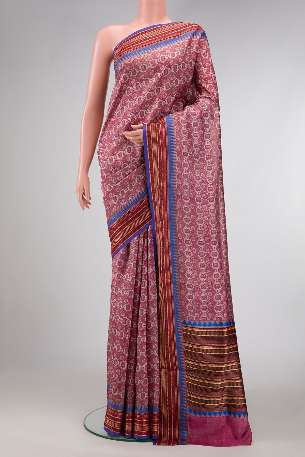 Dark Pink Dual Tone Kanchipuram Silk Saree with Printed design on the body and Zari And Thread Border.  displayed on a mannequin