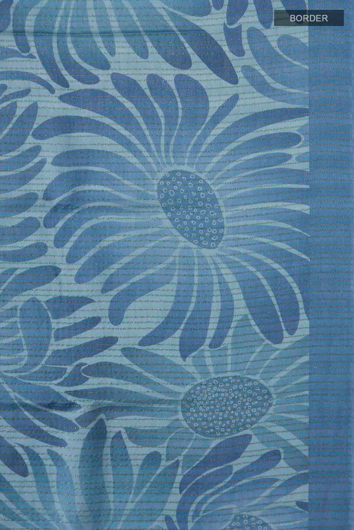 Border image of Blue Crepe Saree Printed design on the body and Zari Border
