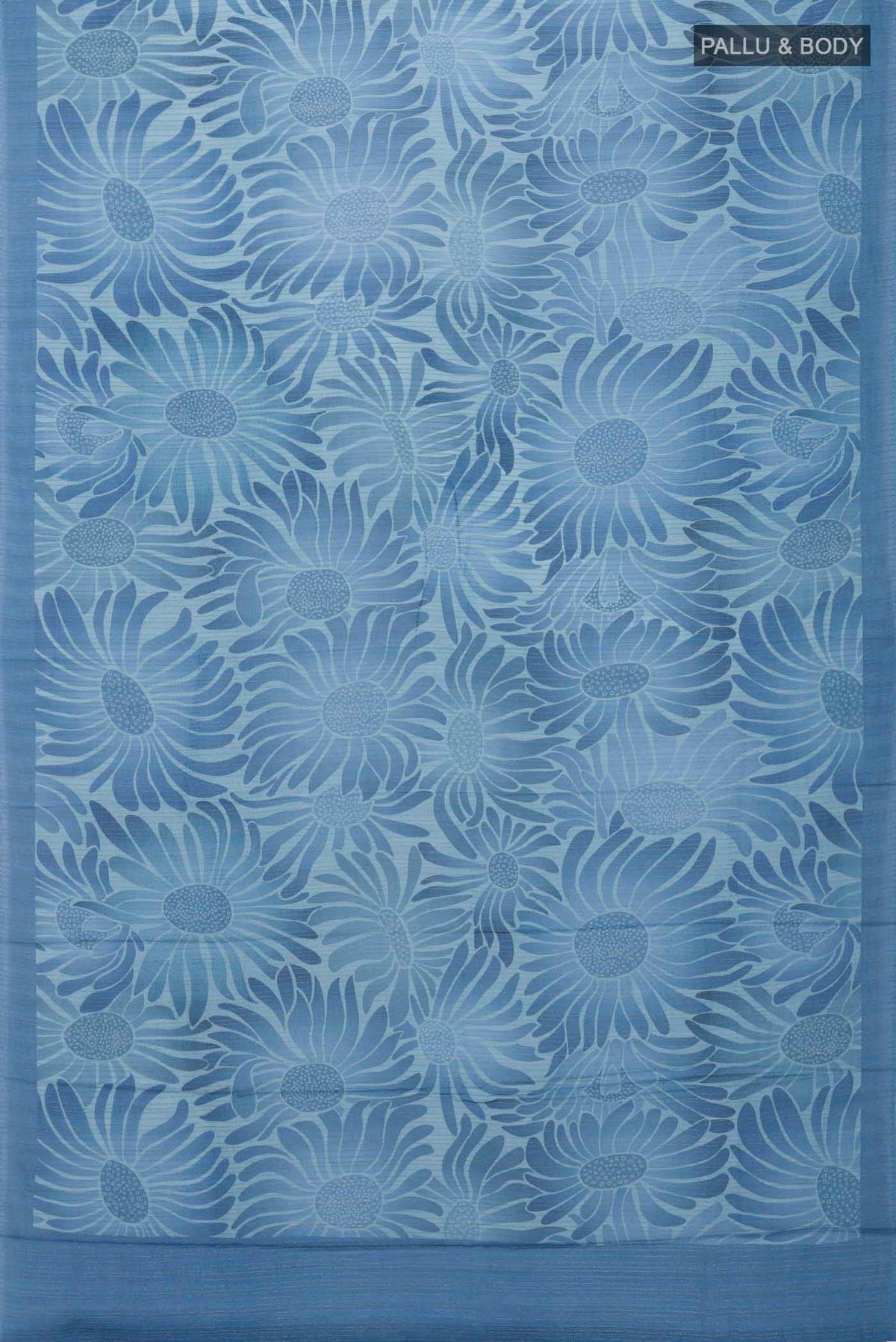 Flat view of Blue Crepe Saree Printed design on the body and Zari Border