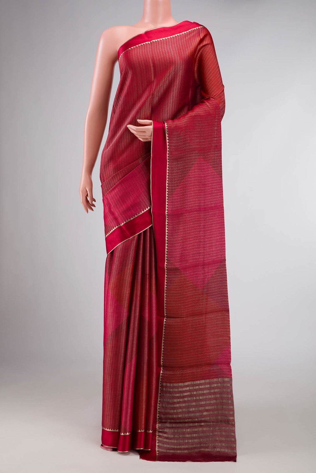 Maroon Dual Tone Mysore Georgette Saree with Zari Brocade on the body and Zari Border displayed on a mannequin