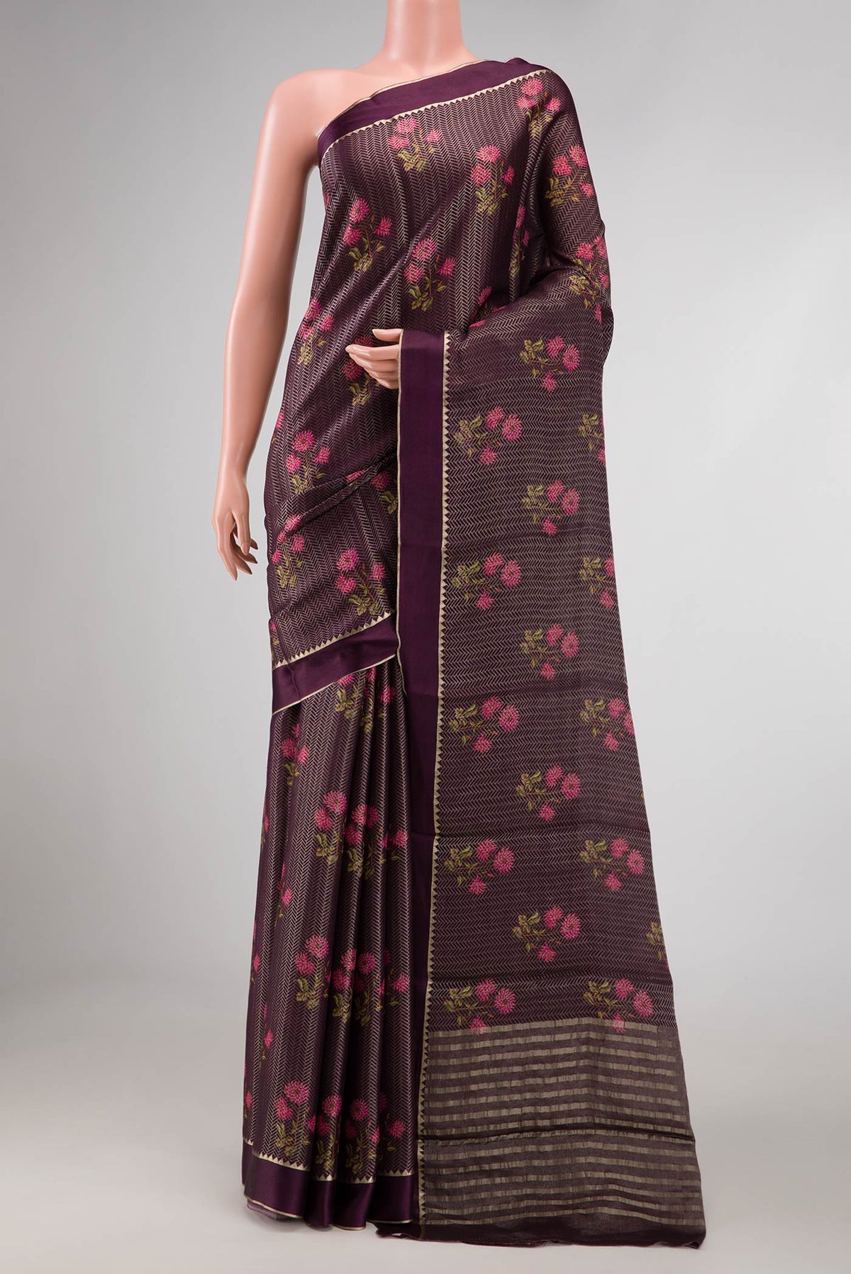 Burgundy Dual Tone Mysore Georgette Saree with Zari Brocade on the body and Zari And Thread Border displayed on a mannequin