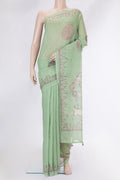 Pista Green Dual Tone Chanderi Silk Saree with Printed design on the body and Printed Border.  displayed on a mannequin