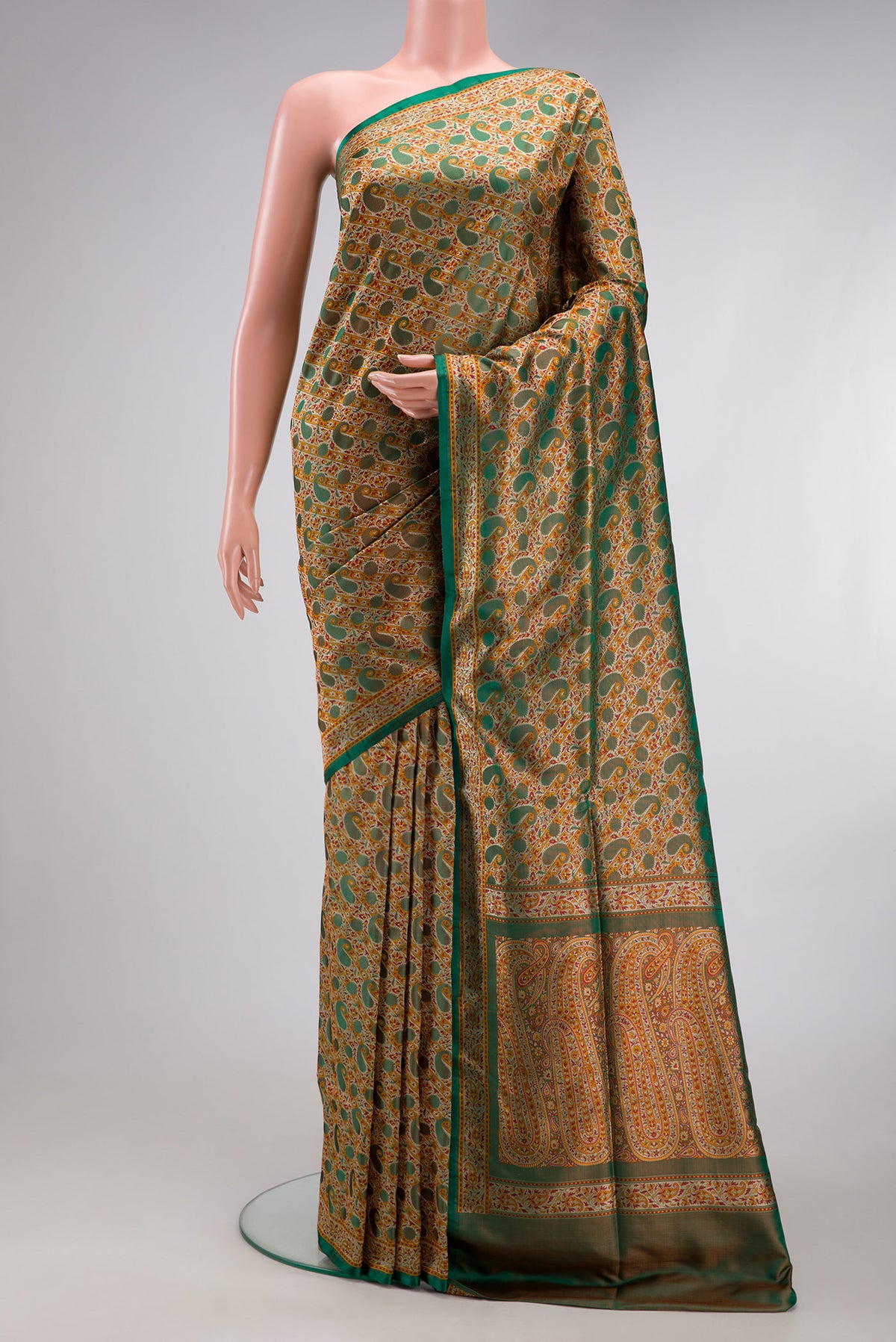 Green Dual Tone Banarasi Tanchoi Silk Saree with Jacquard design on the body and Fancy Border.  displayed on a mannequin