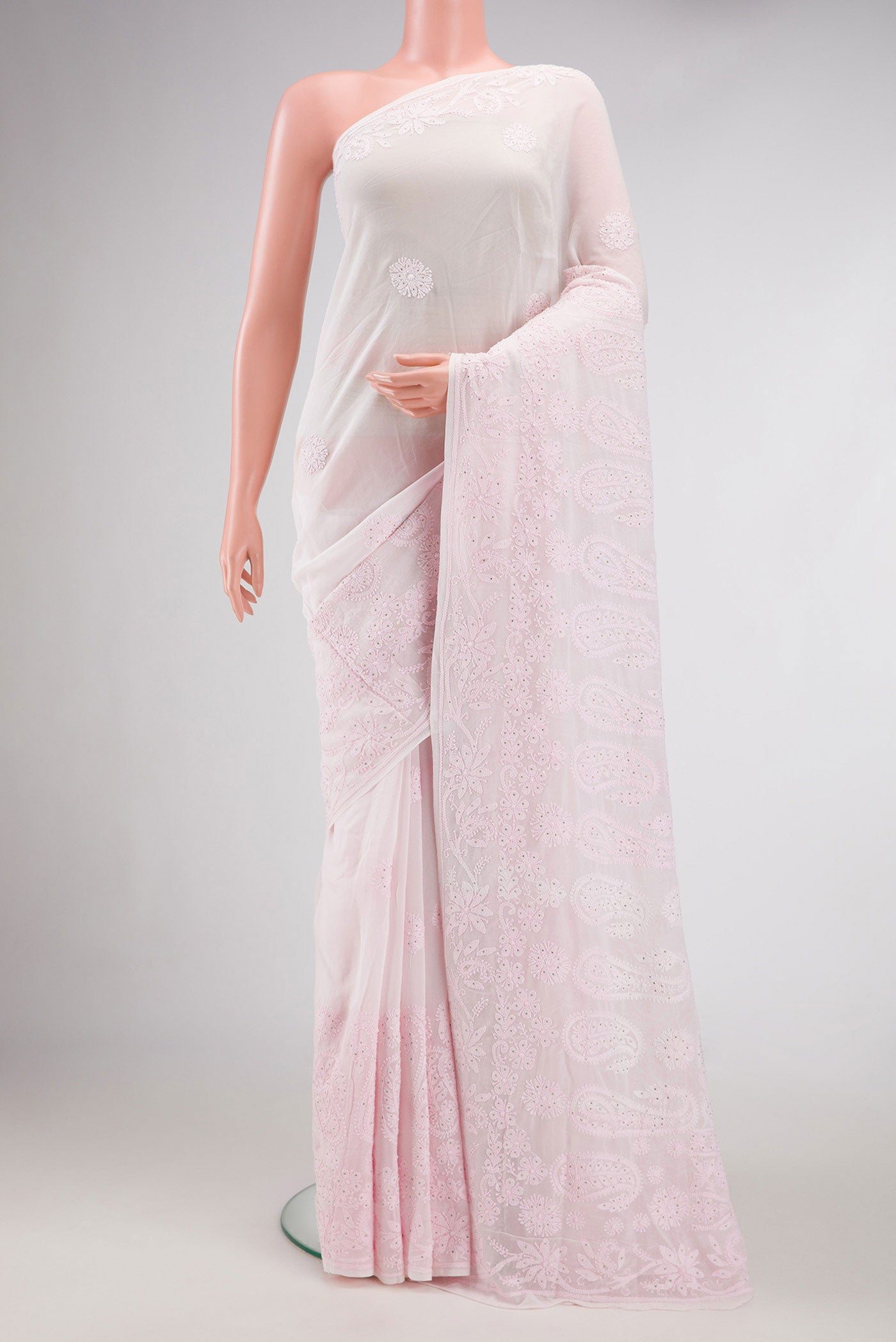 Rose pink Dual Tone Georgette Saree with Embroidery on the body and Embroidery Border.  displayed on a mannequin