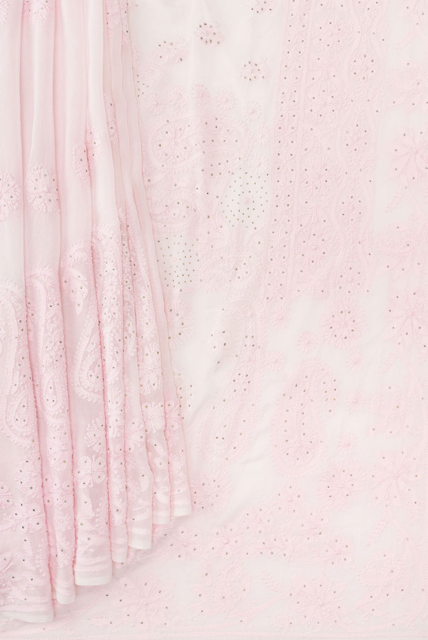 Pleats and pallu of Rose pink Dual Tone Georgette Saree with Embroidery on the body and Embroidery Border. 