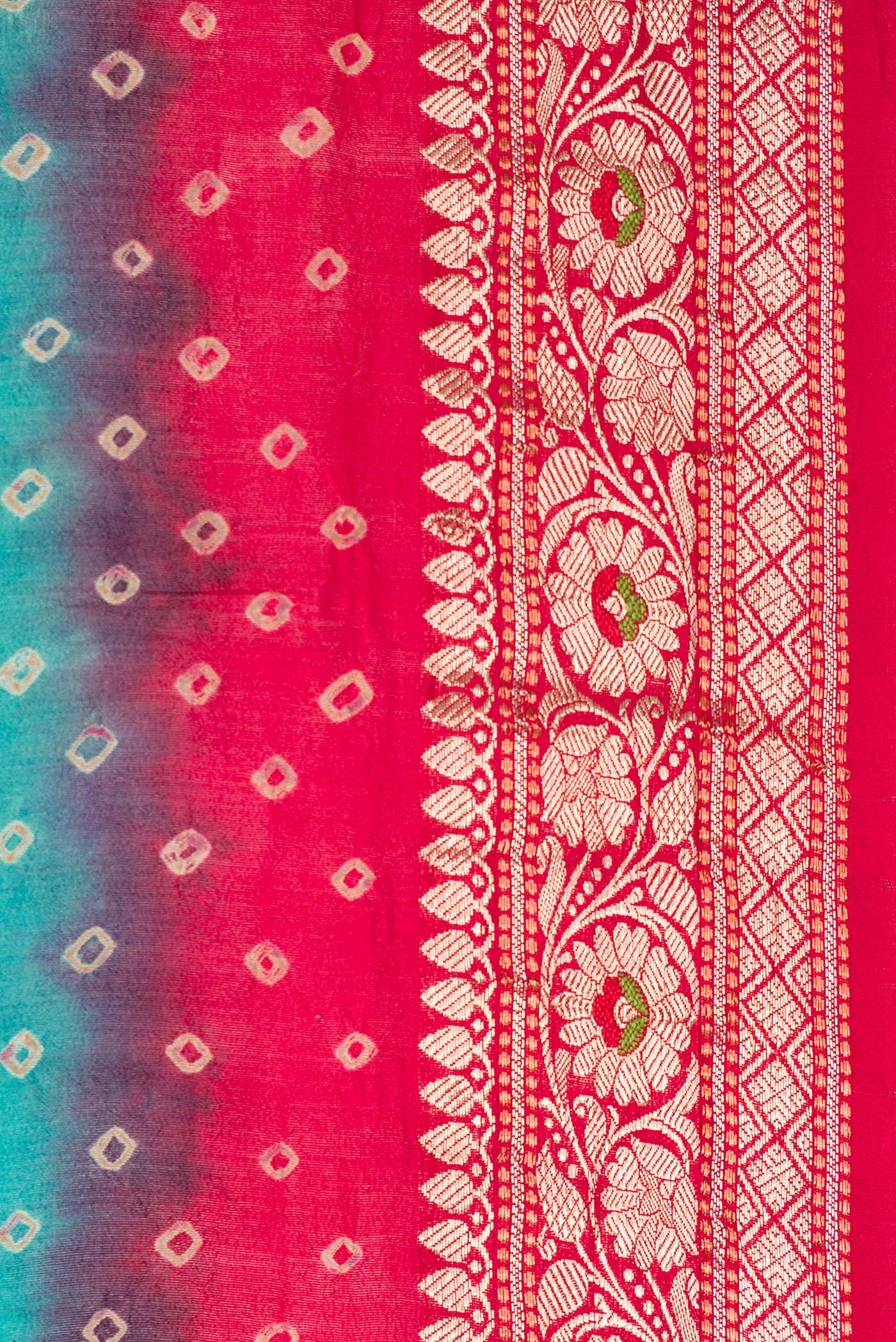 Border image of Sky Blue Dual Tone Bandhani Silk Saree with Bandhani Print on the body and Zari Border. 