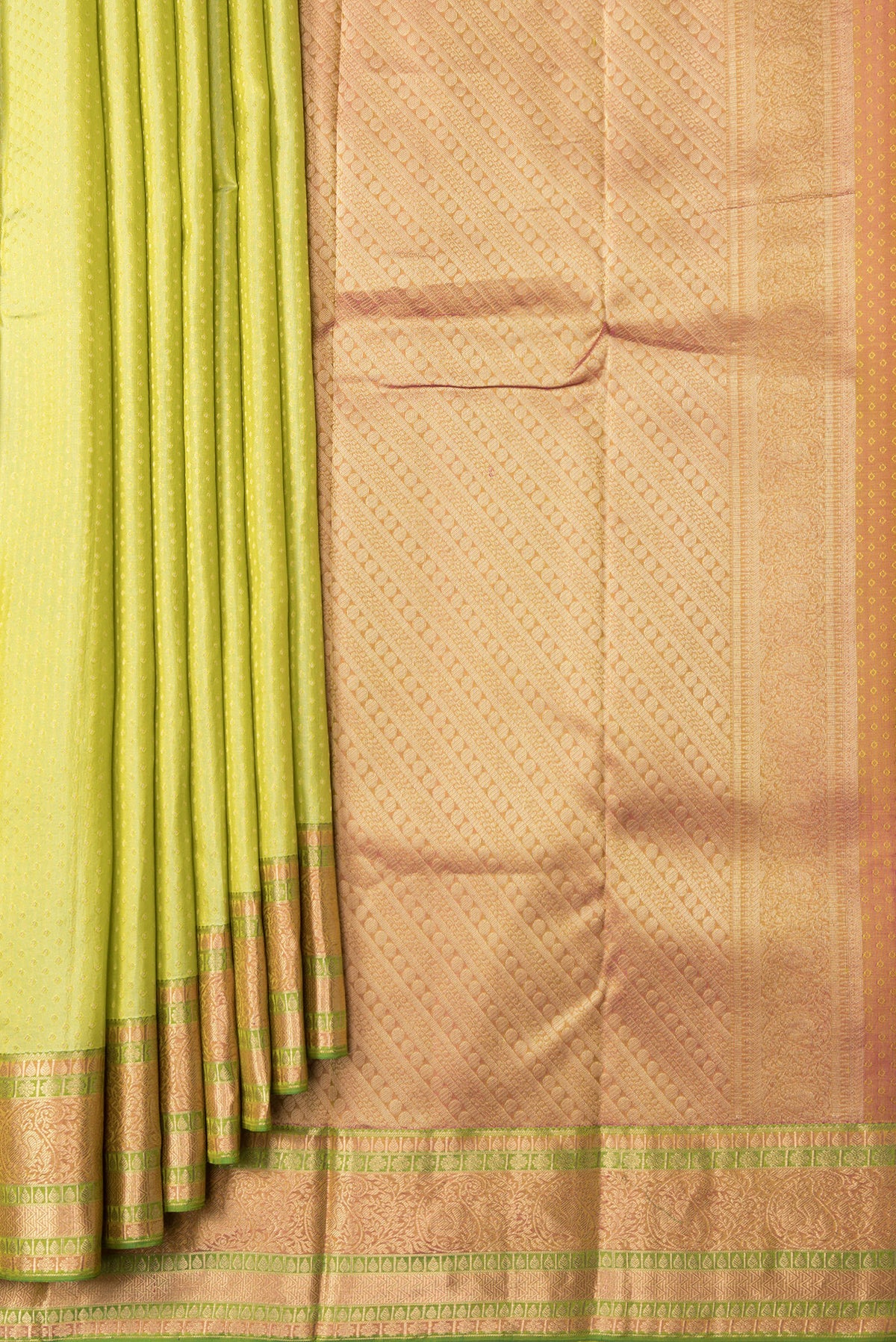 Pleats and pallu of Pista Green Dual Tone Kanchipuram Silk Saree with Zari Butta on the body and Zari Border. 