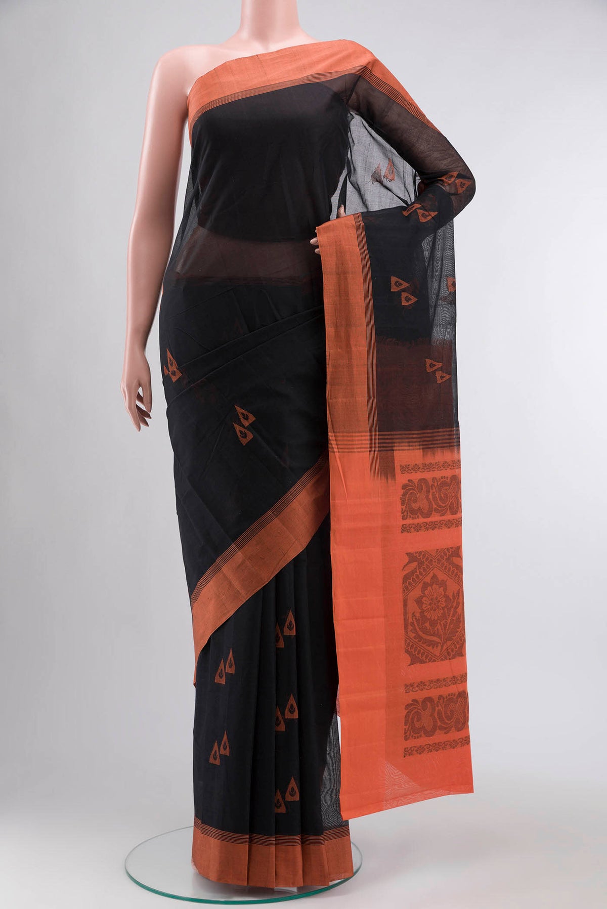 Black Kanchi Cotton Saree with Thread Butta on the body and Plain Border displayed on a mannequin