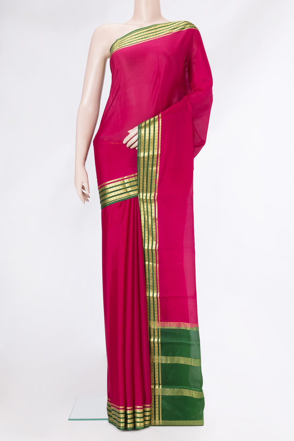 Pink Mysore Crepe Saree with Plain Body and Zari Border.  displayed on a mannequin
