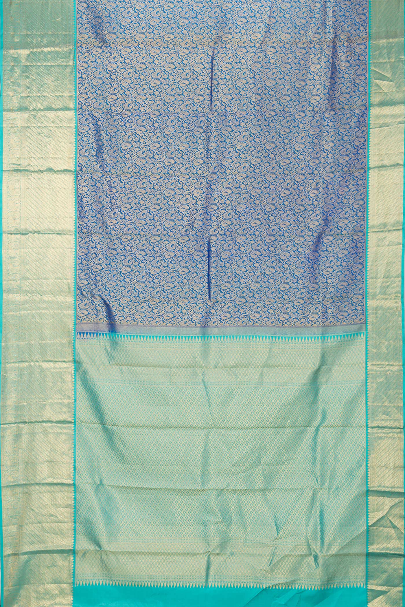Flat view of Royal Blue Dual Tone Kanchipuram Silk Saree with Zari Brocade on the body and Zari Border. 