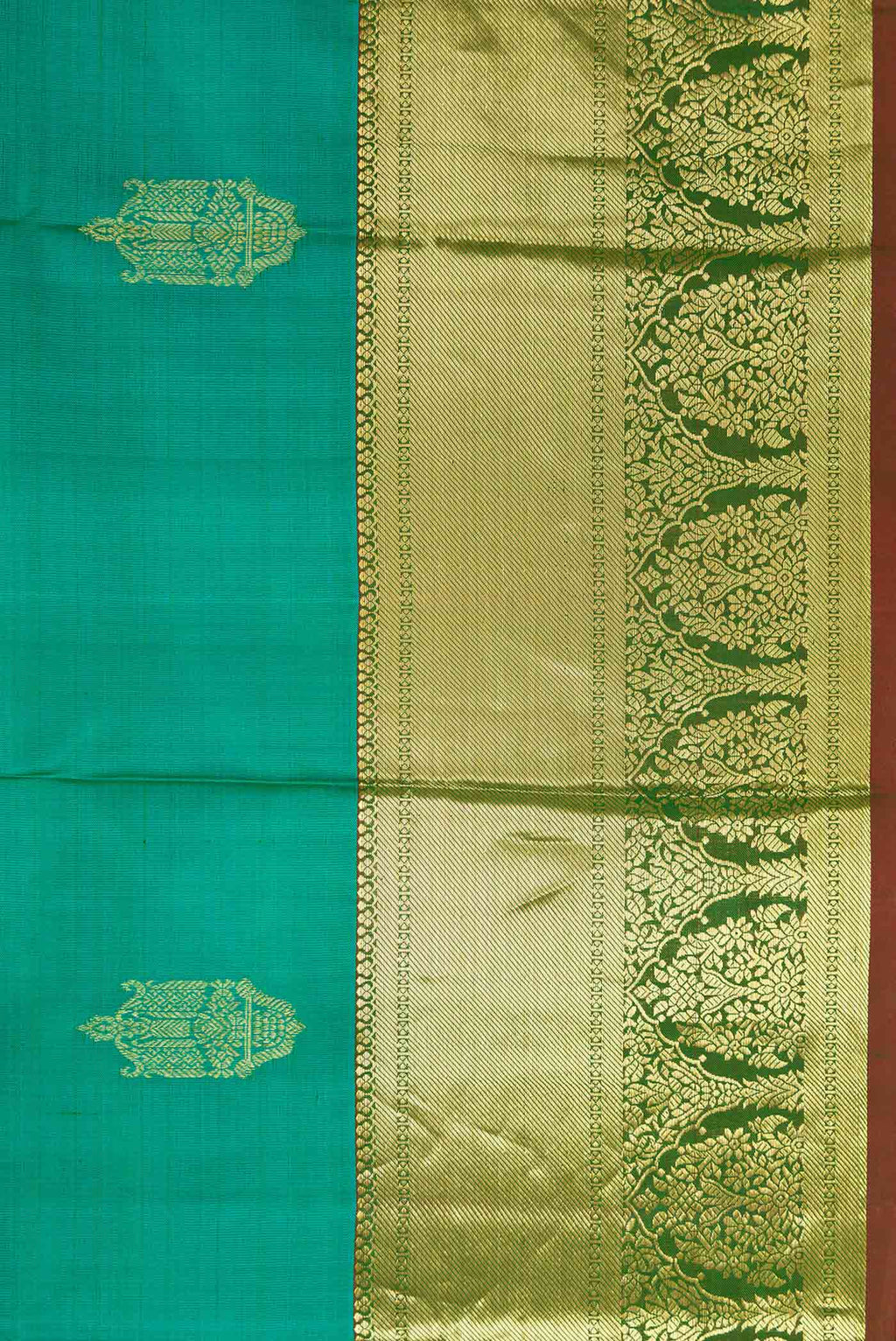 Border image of Sea Green Dual Tone Kanchipuram Silk Saree with Zari Butta on the body and Zari Border. 