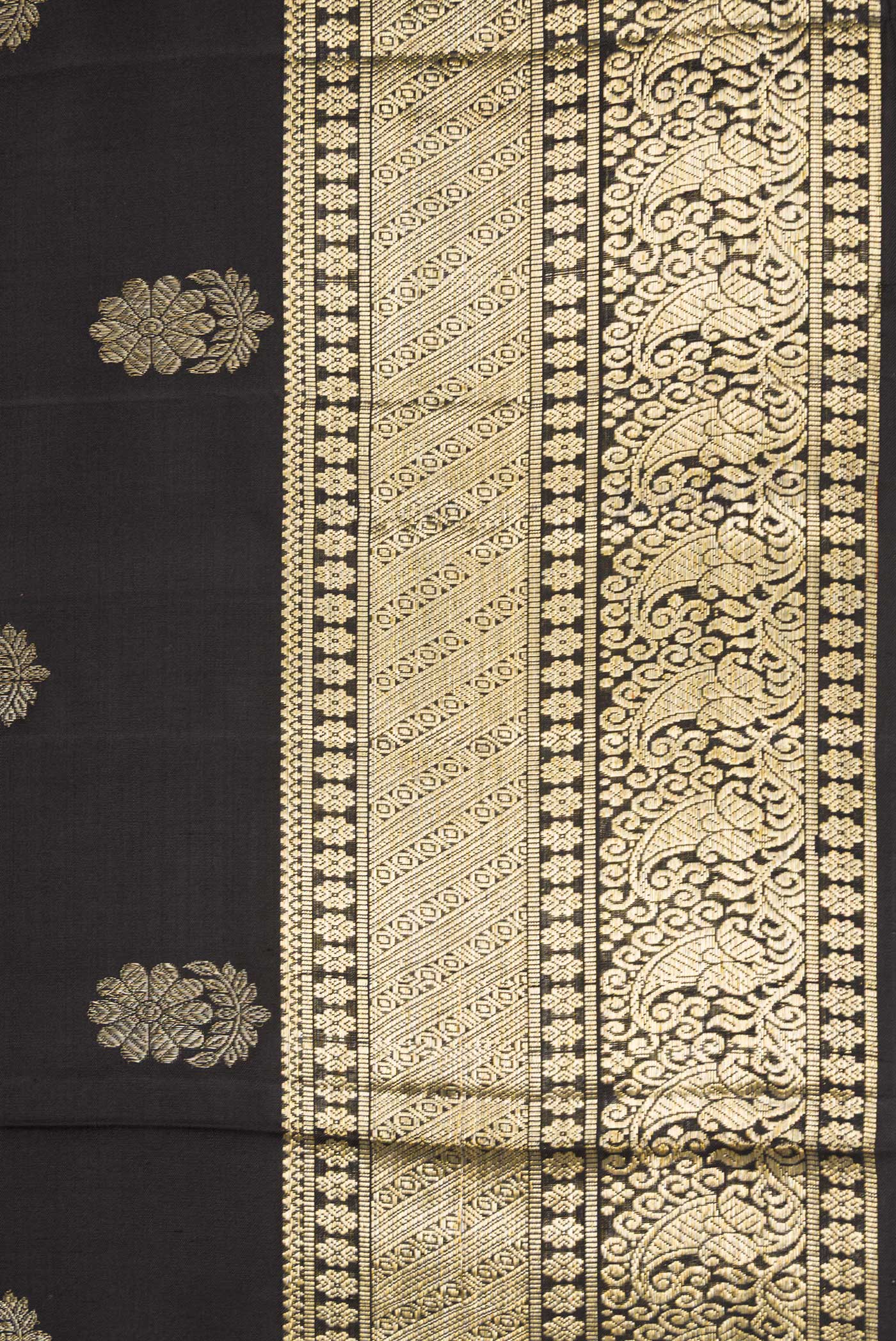 Border image of Black Dual Tone Kanjivaram Silk Saree with Zari Butta on the body and Zari Border. 