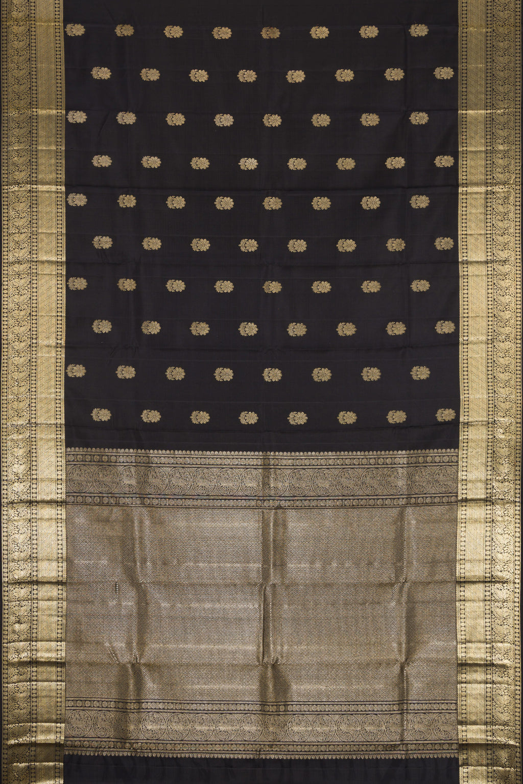 Flat view of Black Dual Tone Kanjivaram Silk Saree with Zari Butta on the body and Zari Border. 