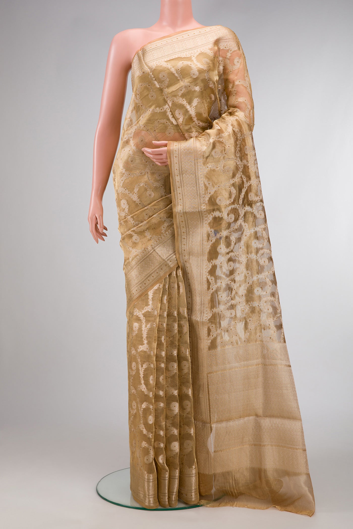 Mustard Dual Tone Organza Silk Saree with Zari Brocade on the body and Zari Border.  displayed on a mannequin