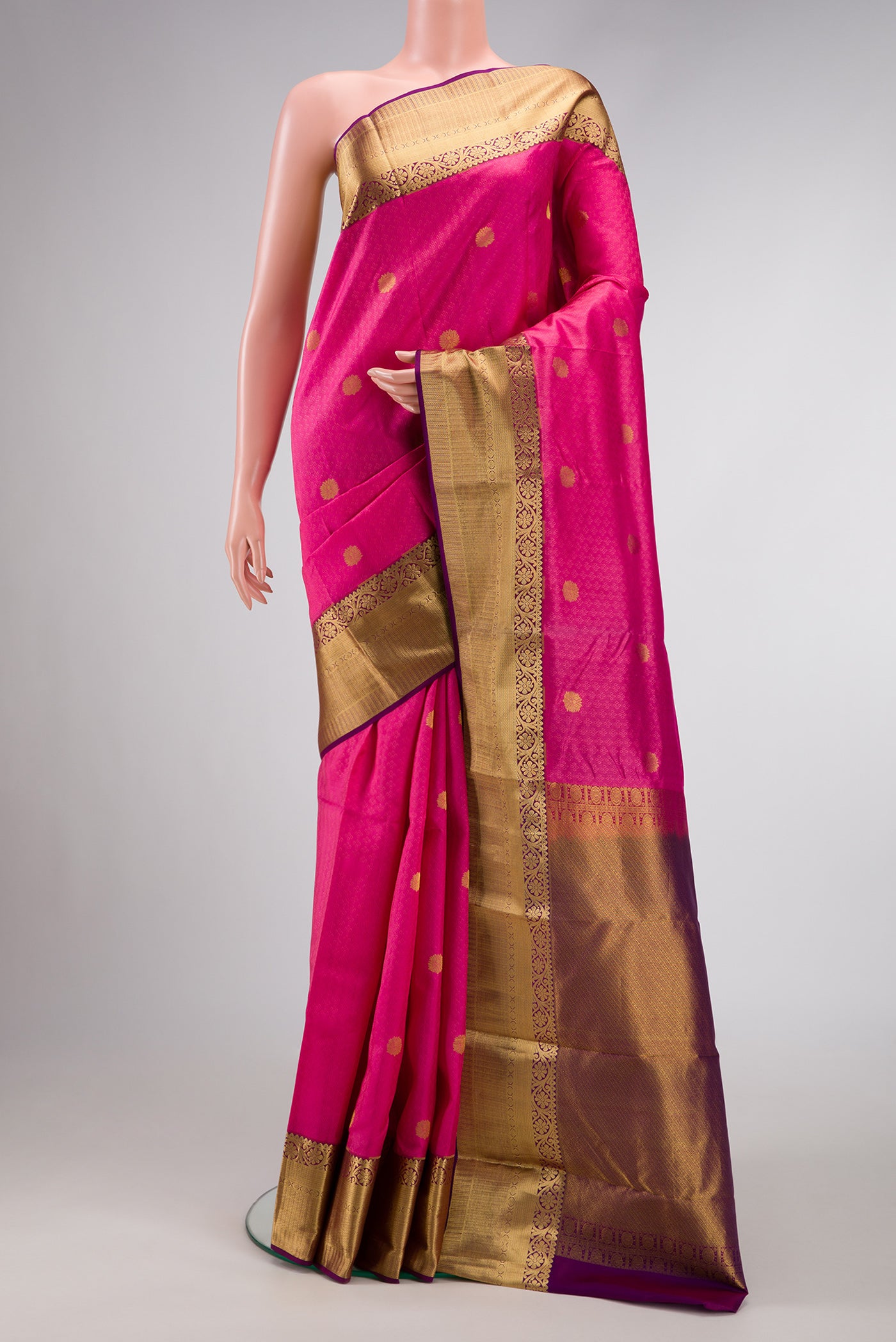 Pink Dual Tone Kanchipuram Silk Saree with Jacquard With Zari Butta on the body and Zari Border.  displayed on a mannequin