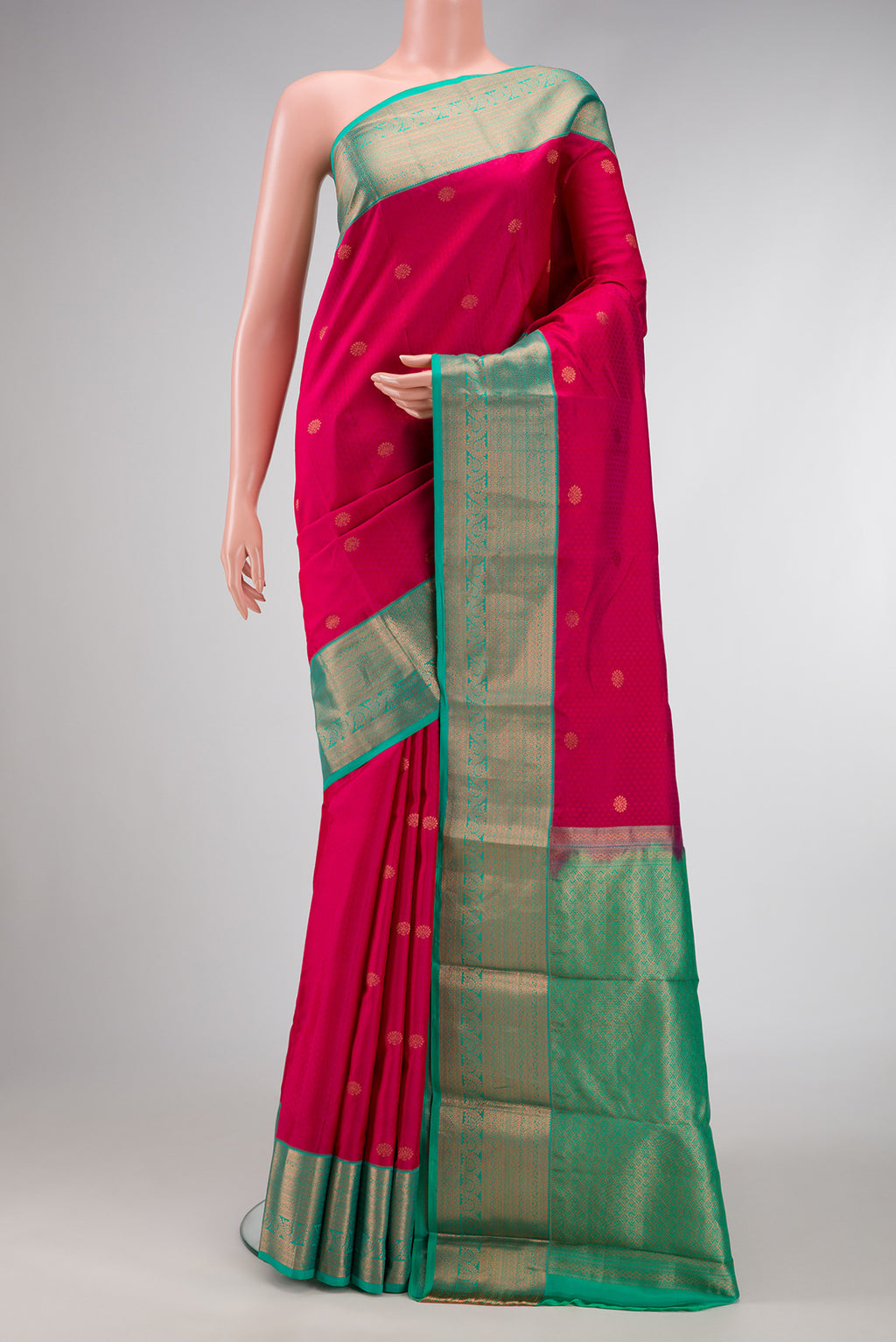 Pink Dual Tone Kanchipuram Silk Saree with Jacquard With Zari Butta on the body and Zari Border.  displayed on a mannequin