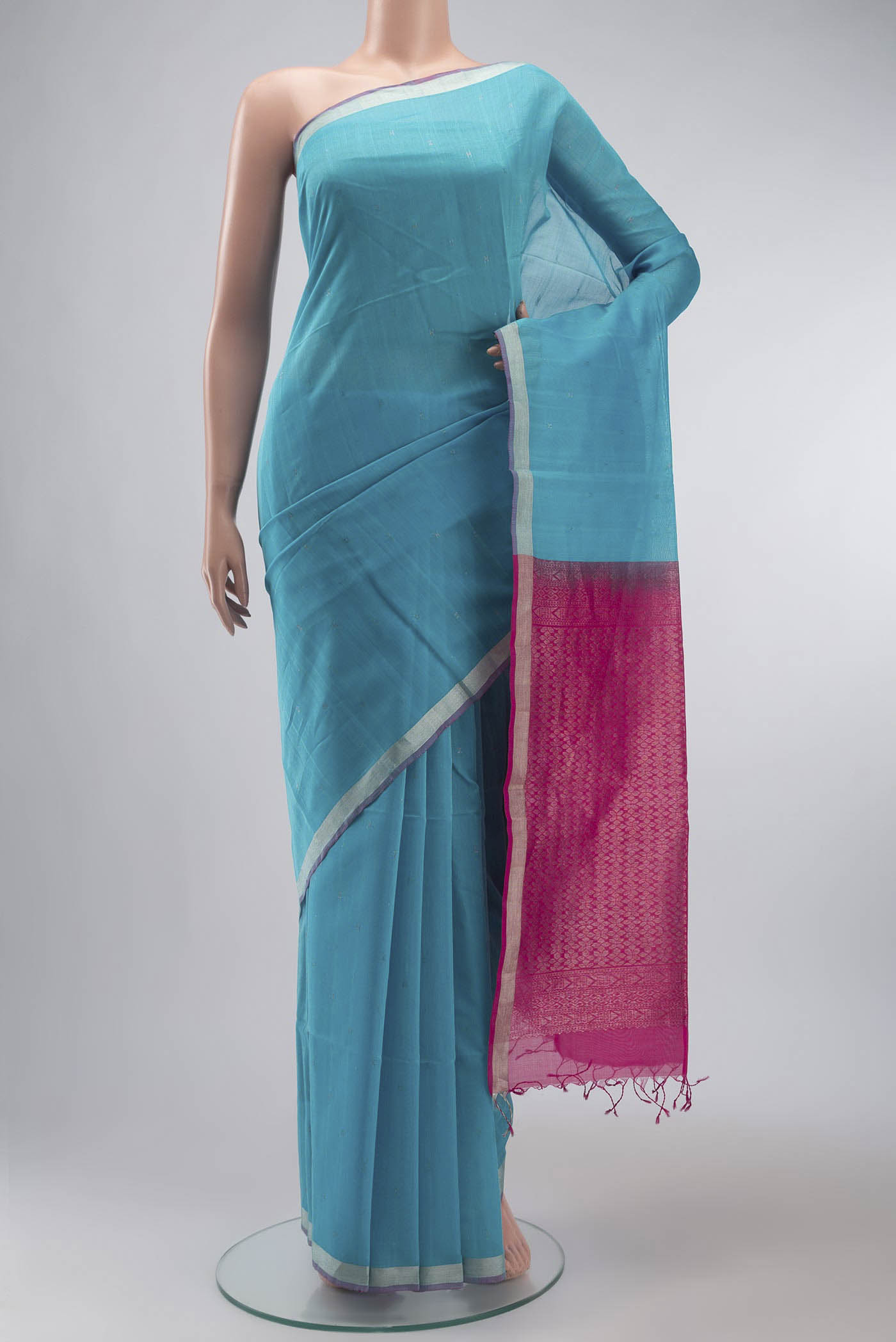 Blue Silk Cotton Saree with Zari Butta on the body and Zari Border displayed on a mannequin