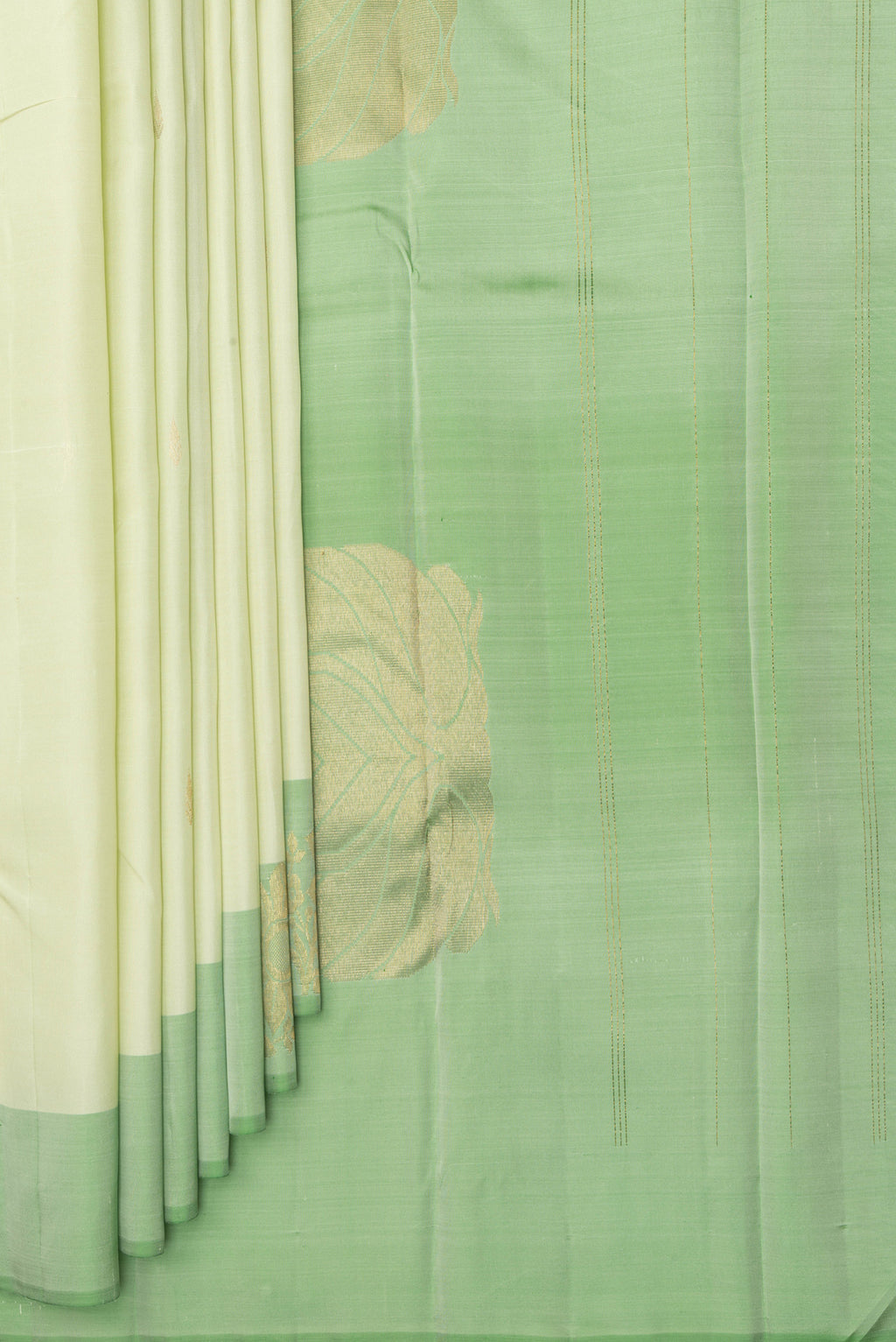 Pleats and pallu of Pure Silk Light Green Kanjivaram Saree with Zari Butta on the body and Fancy Border. 