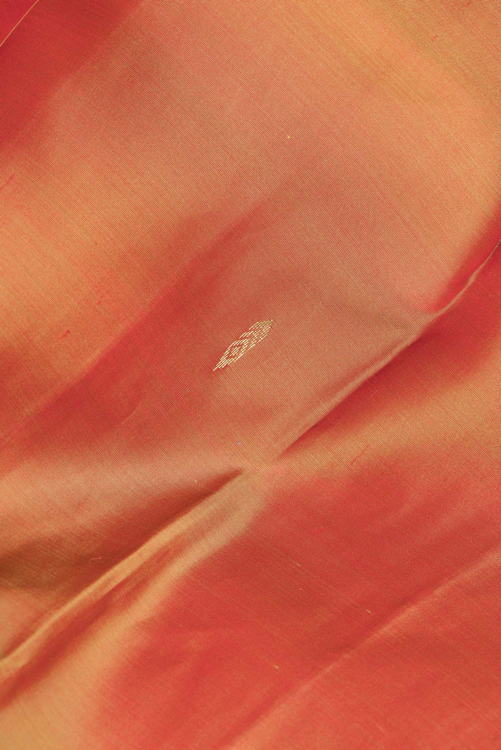 Close up of Pure Silk Mustard Dual Tone Kanjivaram Saree with Zari Butta on the body and Fancy Border.  displaying folds