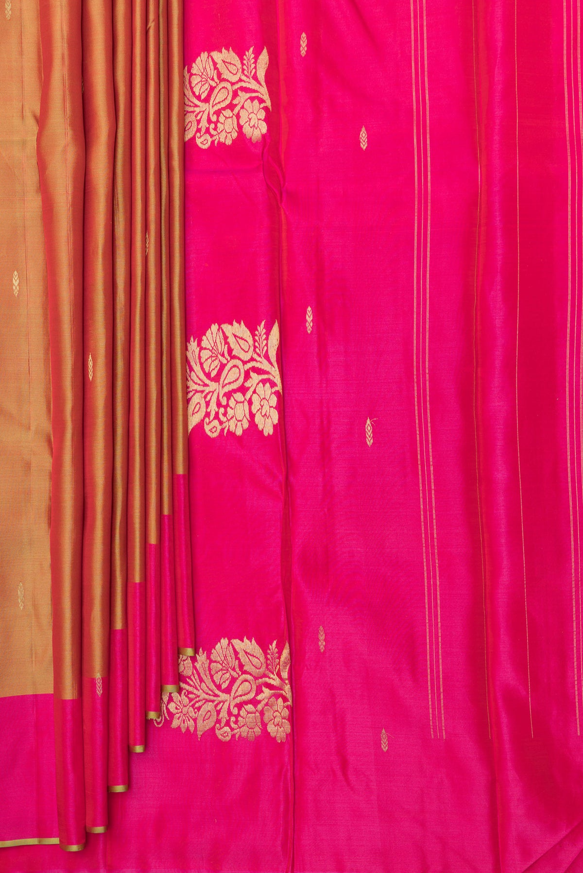 Pleats and pallu of Pure Silk Mustard Dual Tone Kanjivaram Saree with Zari Butta on the body and Fancy Border. 