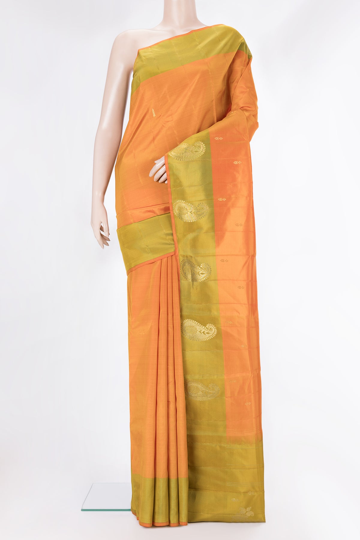 Pure Silk Orange Kanjivaram Saree with Zari Butta on the body and Fancy Border.  displayed on a mannequin