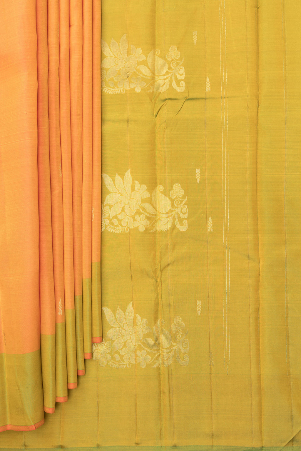 Pleats and pallu of Pure Silk Orange Kanjivaram Saree with Zari Butta on the body and Fancy Border. 