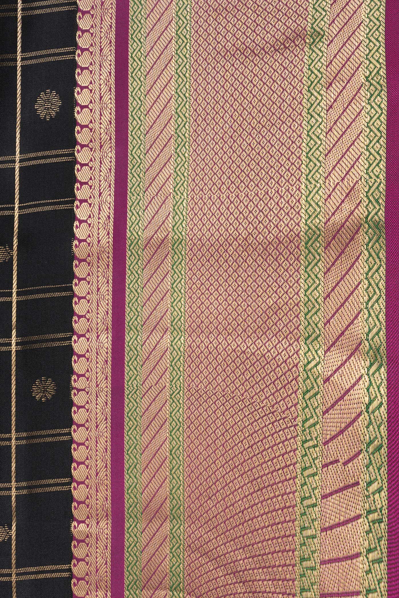 Border image of Black Dual Tone Kanchipuram Silk Saree with Checked design on the body and Zari Border. 