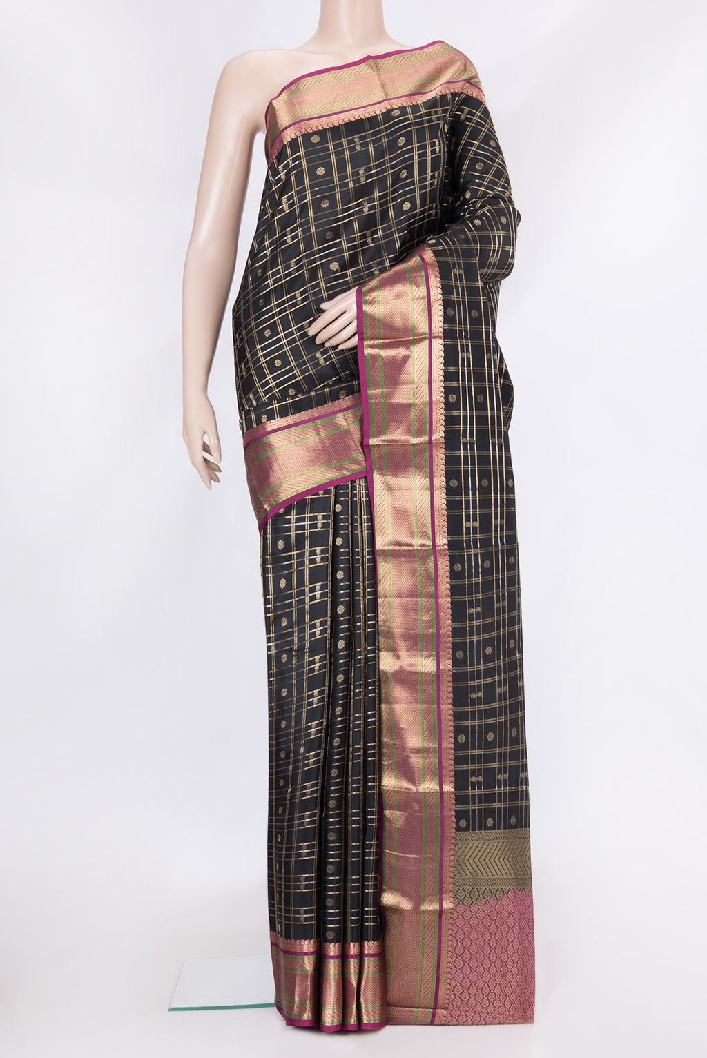 Black Dual Tone Kanchipuram Silk Saree with Checked design on the body and Zari Border.  displayed on a mannequin