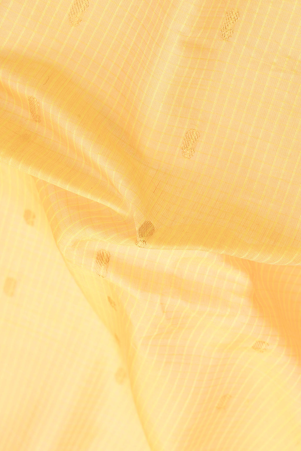 Close up of Sandal Dual Tone Gadwal Silk Cotton Saree with Checked design on the body and Zari Border.  displaying folds