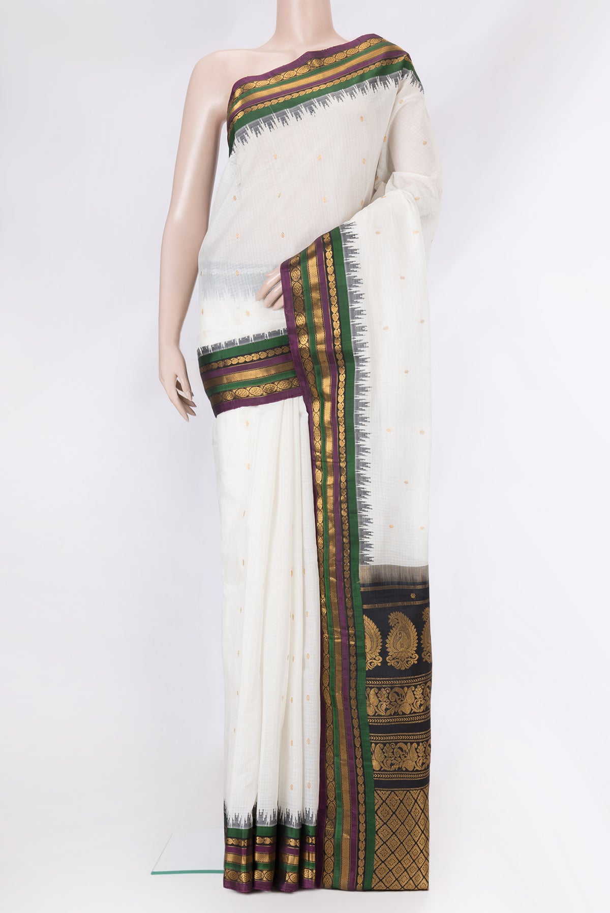White Dual Tone Gadwal Silk Cotton Saree with Checked design on the body and Zari Border.  displayed on a mannequin