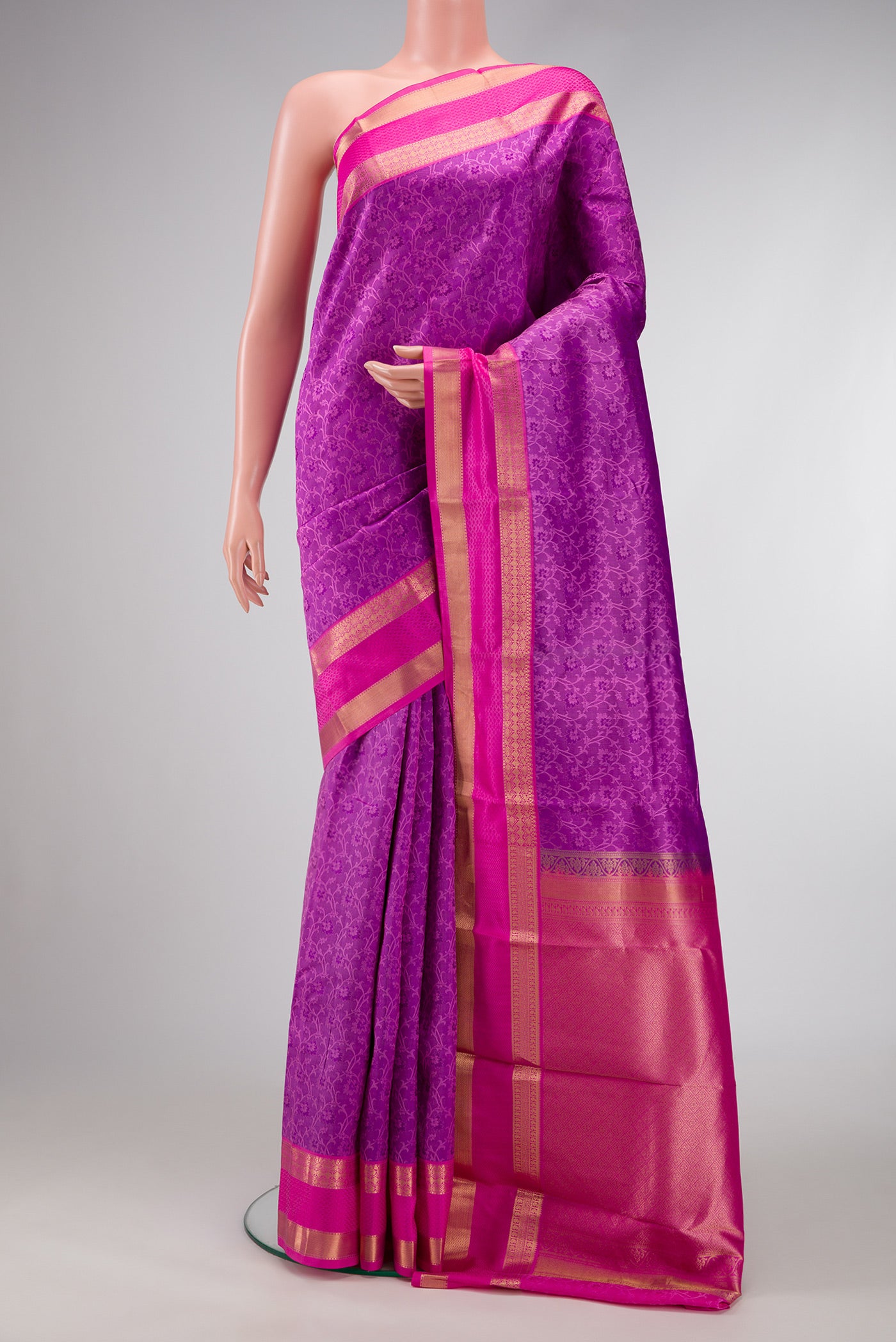 Purple Dual Tone Kanchipuram Silk Saree with Jacquard design on the body and Zari And Thread Border.  displayed on a mannequin