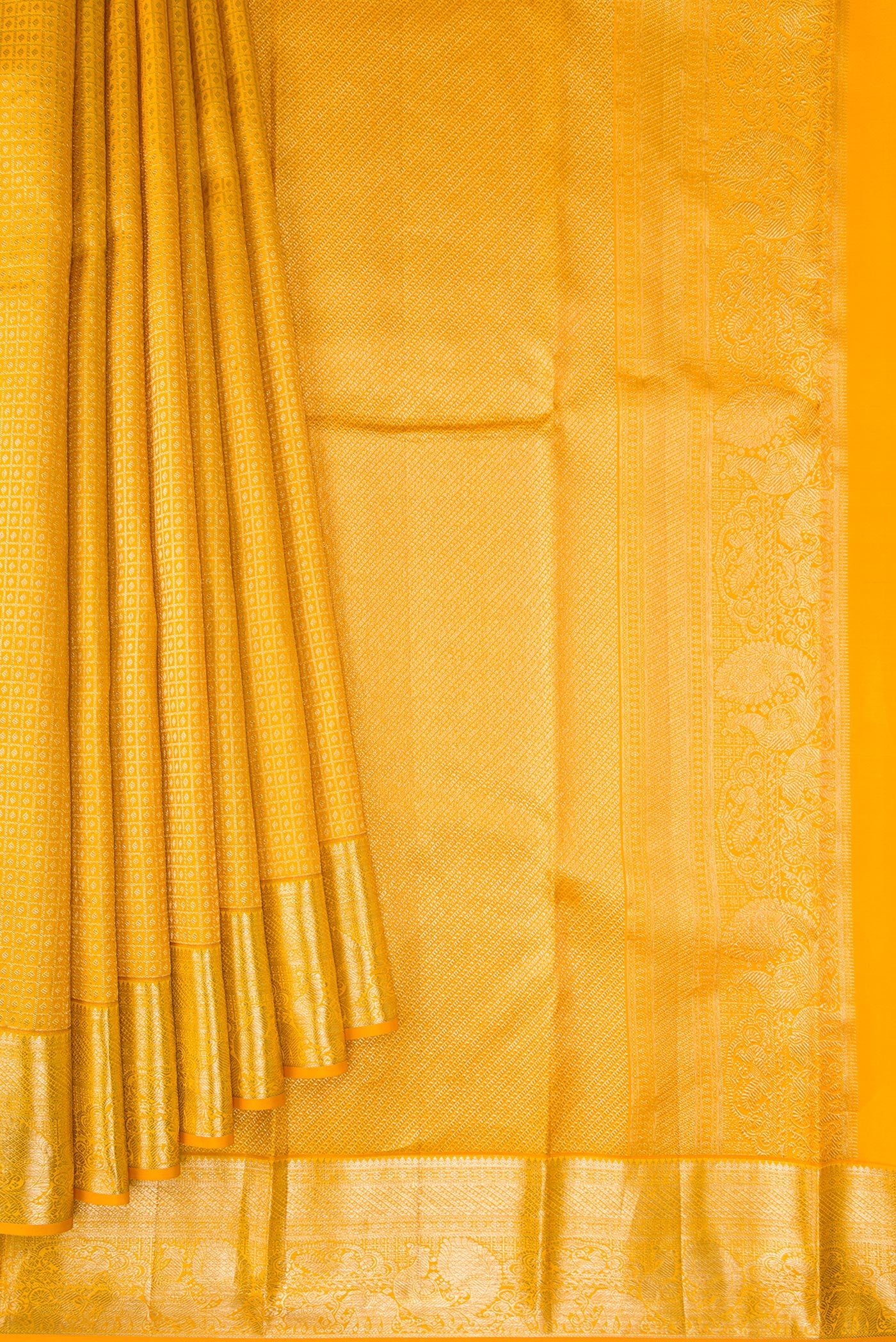 Pleats and pallu of Mustard Dual Tone Kanjivaram Silk Saree with Zari Brocade on the body and Zari Border. 