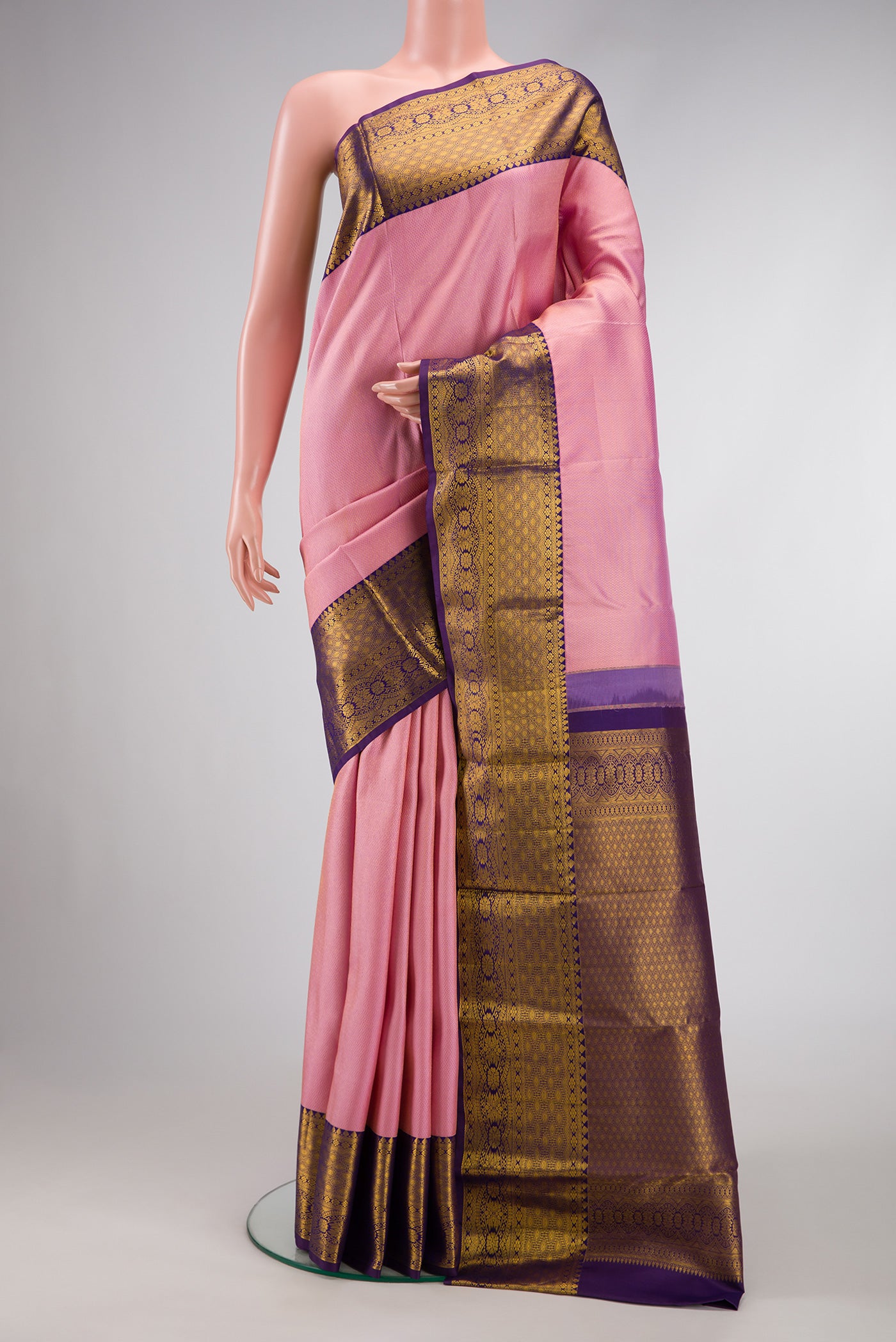 Pink Dual Tone Kanchipuram Silk Saree with Zari Brocade on the body and Zari Border.  displayed on a mannequin