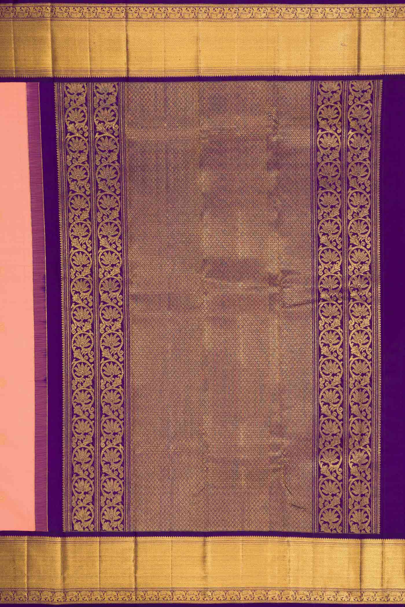 Close up image of the pallu of Peach Dual Tone Kanchipuram Silk Saree with Zari Butta on the body and Zari Border. 