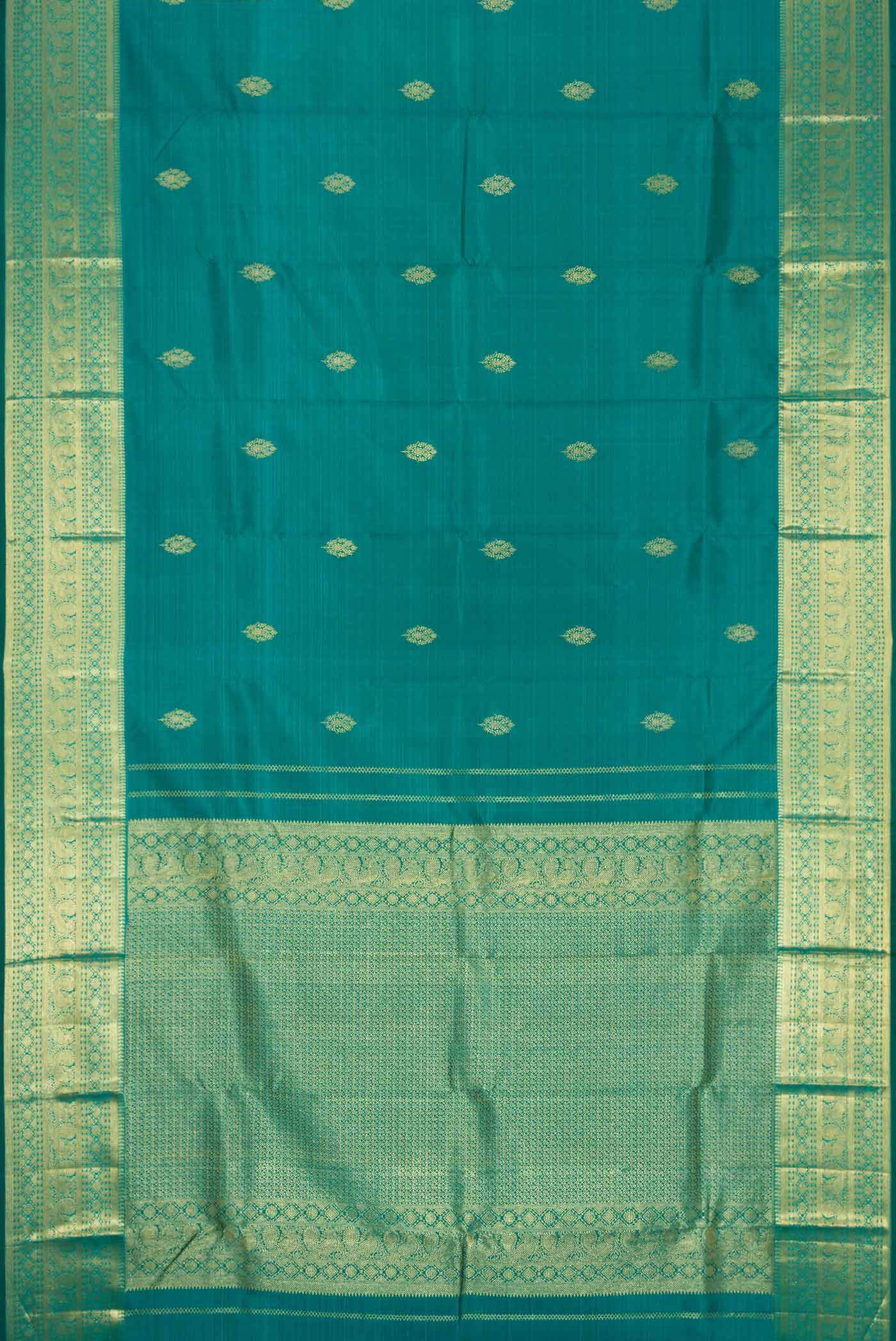 Flat view of Peacock Blue Dual Tone Kanchipuram Silk Saree with Zari Butta on the body and Zari Border. 