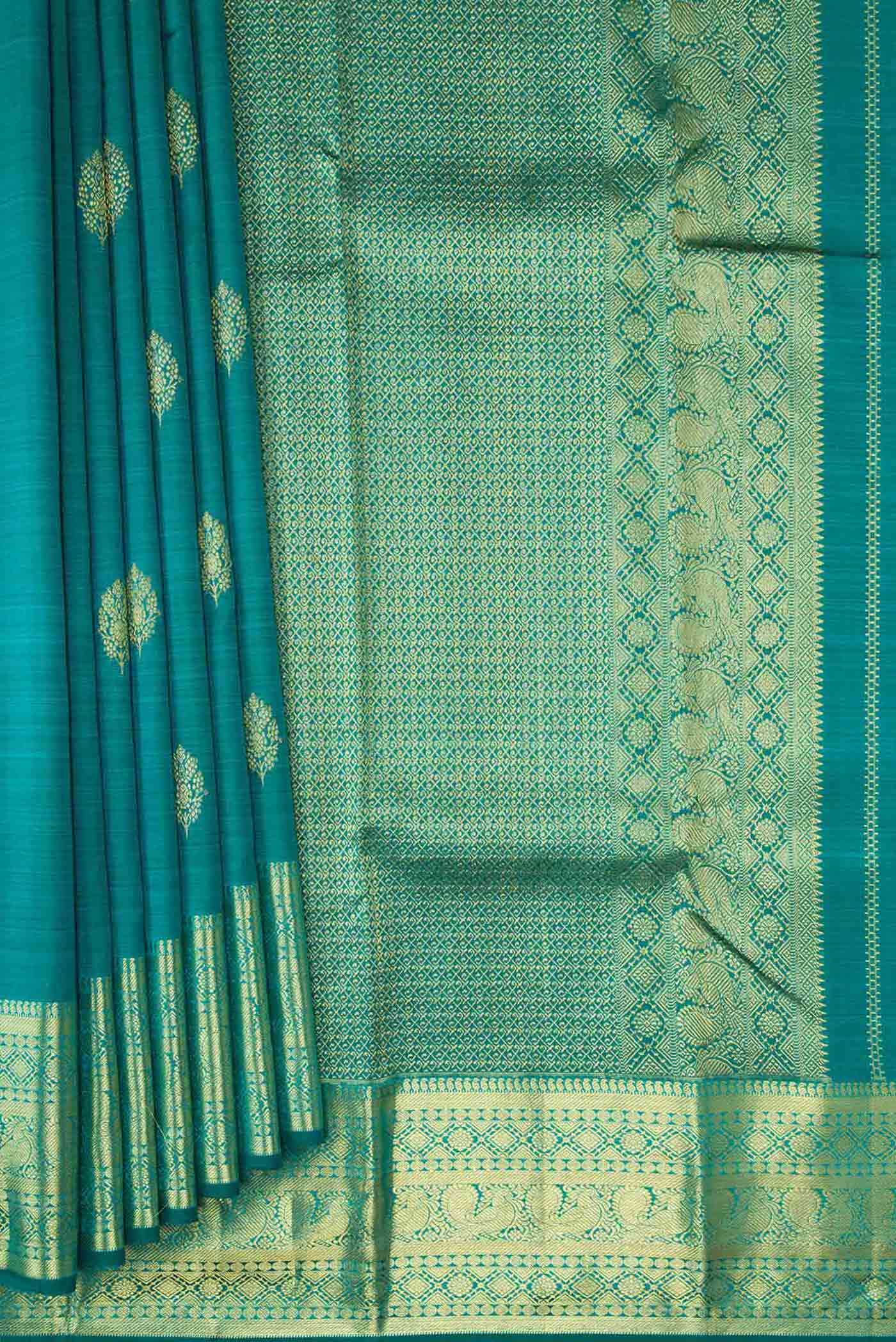 Pleats and pallu of Peacock Blue Dual Tone Kanchipuram Silk Saree with Zari Butta on the body and Zari Border. 