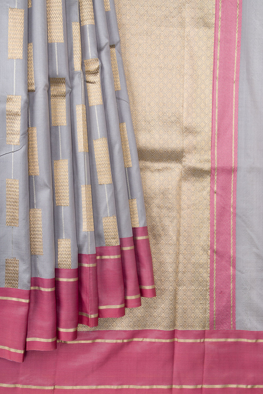 Pleats and pallu of Grey Dual Tone Banarasi Silk Saree with Stripes on the body and Zari Border. 